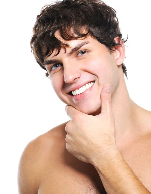 Acne-Treatment Zoomed-in image of clear skin on a smiling man's face, highlighting successful acne treatment by Brandi Terra, NP at Oak & Stone Wellness in East San Diego.