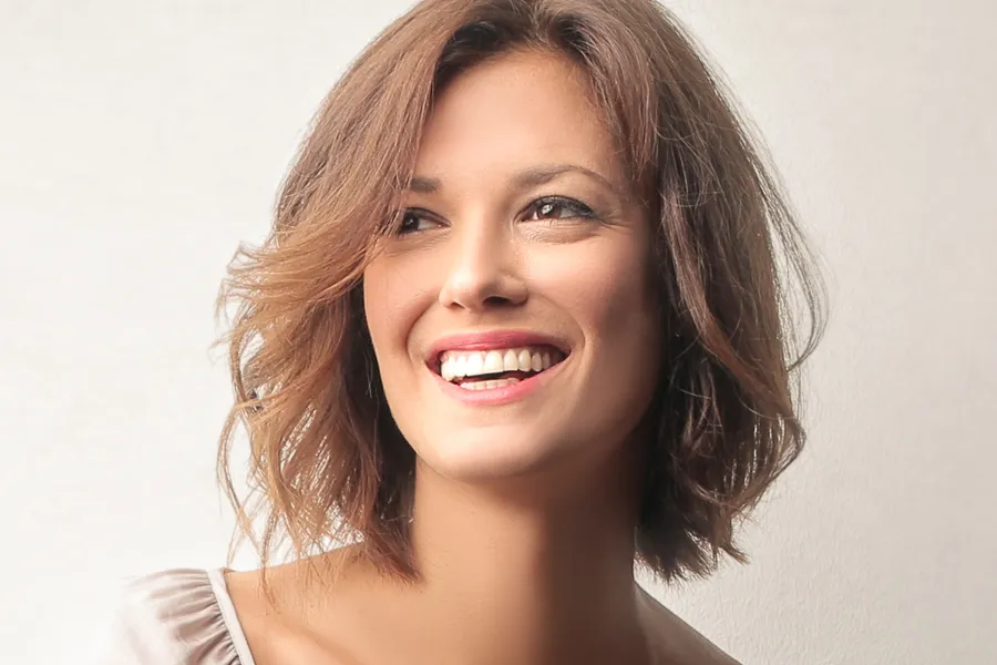 Laser-Skin-Rejuvenation-Clinic A middle-aged woman with smooth skin. Get Laser Skin Rejuvenation treatment from Brandi Terra, NP at Oak & Stone Wellness in East San Diego.