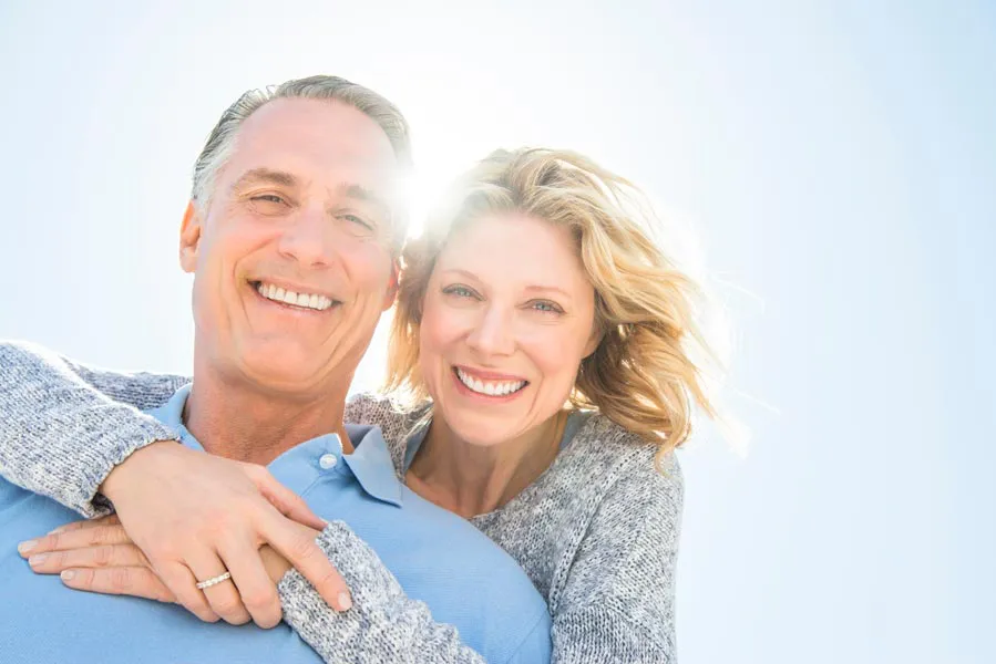 Radiofrequency-Microneedling-for-Age-Spots-Sun-Damage-Specialist A couple with clear radiant skin. Get Radiofrequency Microneedling for Age Spots from Brandi Terra, NP at Oak & Stone Wellness in East San Diego.