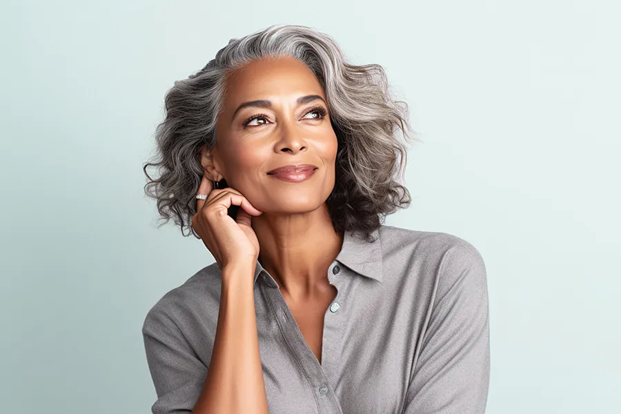 Radiofrequency-Microneedling-for-Skin-Clinic A middle-aged woman with beautiful skin. Schedule Radiofrequency Microneedling for Skin Tightening Treatment from Brandi Terra, NP at Oak & Stone Wellness in East San Diego.